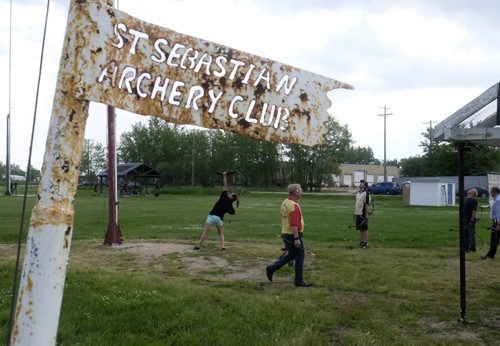 ZACHARY PRONG / WINNIPEG FREE PRESS  Members of the St. Sebastian Archery Club at one of their weekly meetings. The top of the vertical pole stand at 100 ft. June 29, 2016.