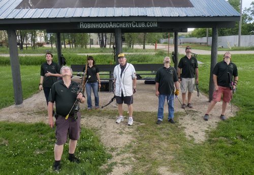 ZACHARY PRONG / WINNIPEG FREE PRESS  Members of the Robin Hood Archery Club watch to see if an arrow hit it's target. June 29, 2016.