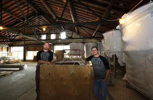 WAYNE GLOWACKI / WINNIPEG FREE PRESS  At right, Kevin Selch the founder of Little Brown Jug Brewing Company and  brewmaster Bernhard Wieland in their new brewery under construction on William Ave. Ben MacPhee-Sigurdson¤story     July 19 2016