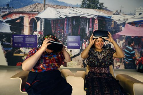 WAYNE GLOWACKI / WINNIPEG FREE PRESS  Seated at left is Amparo de León and Oralia Chopén, two Guatemalan Maya women artisans remove  virtual reality googles Tuesday after  viewing scenes from their Trama Textiles co-operative in Guatemala that is part of the Canadian Museum for Human Rights exhibit called Empowering Women: Artisan Cooperative that Transform Communities. "The exhibition explores how working collectively enables women to support their families, transform their communities and preserve their traditional arts.  Carol  Sanders story     July 19 2016