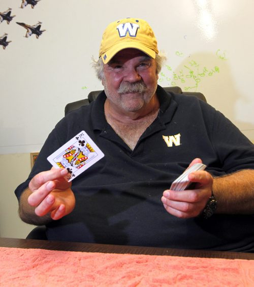BORIS MINKEVICH / WINNIPEG FREE PRESS Bomber Veteran offensive line guru Bob Wylie, is also a magician. This is for a Wiecek column. Photos shot in his office at IGF. July 19, 2016