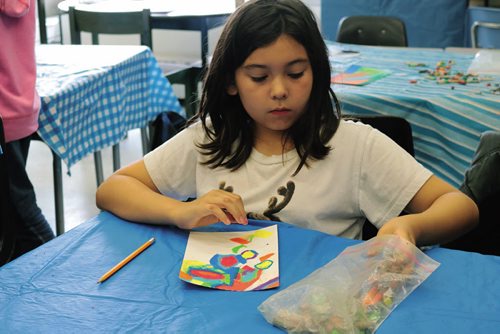 Canstar Community News July 13, 2016 - Grade 5 student Ally Smith paints a picture at the Balanced Experiential Education Program at O.V. Jewitt School Community School.