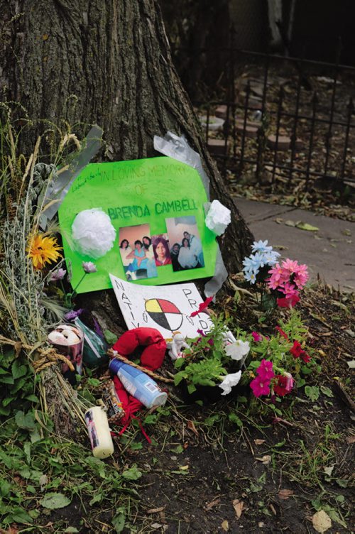 Canstar Community News July 12, 2016 - Memorial put in front of the rooming house on Austin Street North that caught on fire July 6, 2016. (Ligia Braidotti/Canstar Community News)