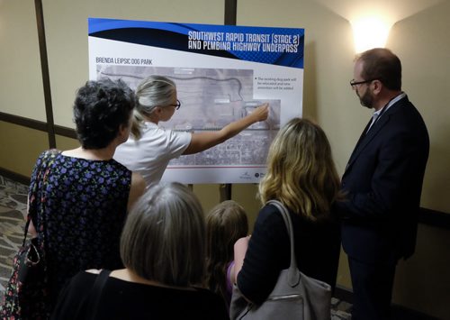 ZACHARY PRONG / WINNIPEG FREE PRESS  People look at newly unveiled plans for Stage 2 of the city's Southwest Rapid Transitway project. Citizens and City staff gathered at the Canada Inns Fort Garry on Pembina Highway for an information session on new developments. The five year project will extend the the city's first transit corridor to the University of Manitoba and widen the Pembina Highway underpass at Jubilee Ave. to six lanes. July 19, 2016.