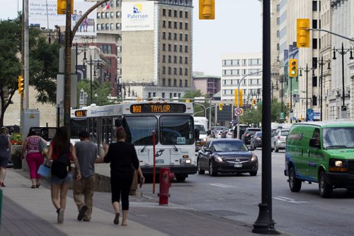 RUTH BONNEVILLE / WINNIPEG FREE PRESS  Photos of the corner of Portage Ave. and Main Street for story on opening the intersection up for pedestrian traffic.  Traffic looking north from south west side of Main street.      July 20, 2016