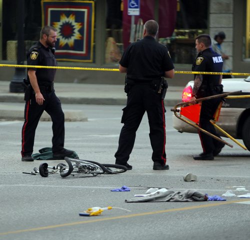 BORIS MINKEVICH / WINNIPEG FREE PRESS MVC involving a cyclist at Main and Logan. July 19, 2016