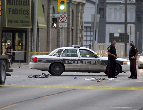 BORIS MINKEVICH / WINNIPEG FREE PRESS MVC involving a cyclist at Main and Logan. July 19, 2016