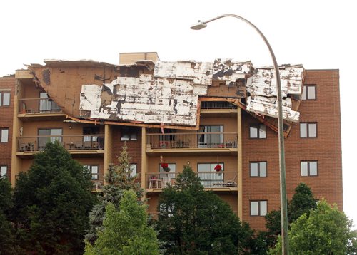 BORIS MINKEVICH / WINNIPEG FREE PRESS One side of an apartment complex called Parkway Plaza at 2000 Sinclair (near Leila) was victim to a vicious storm that passed through Winnipeg this evening. It ripped the roof off one building. July 20, 2016