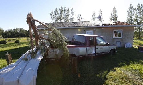 WAYNE GLOWACKI / WINNIPEG FREE PRESS    The back yard of Clemance Assiniboine's home on the Long Plain First Nation¤where sheds, his house and motor home were damaged after a tornado touched down Wednesday night. Ashley Prest story  July 21 2016