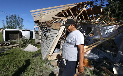 WAYNE GLOWACKI / WINNIPEG FREE PRESS      John Boyd at his home on the Long Plain First Nation surveying last night's tornado damage. He and his wife were luckily not at home at the time of the destruction.   Ashley Prest story  July 21 2016