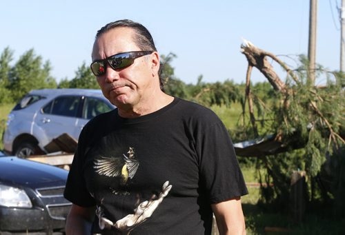 WAYNE GLOWACKI / WINNIPEG FREE PRESS   Chief Dennis Meeches of the Long Plain First Nation looks at the  damage after a tornado Wednesday night.     Ashley Prest story  July 21 2016