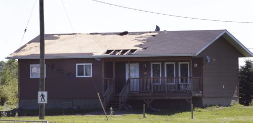 WAYNE GLOWACKI / WINNIPEG FREE PRESS    A home on the Long Plain First Nation with roof damage after the tornado Wednesday night.     Ashley Prest story  July 21 2016