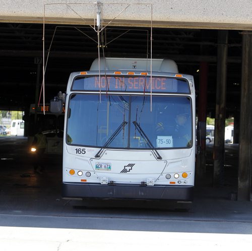 BORIS MINKEVICH / WINNIPEG FREE PRESS General Winnipeg Transit garage photos taken at 421 Osborne St. Photos taken from the sidewalk of the garages with open doors. July 21, 2016