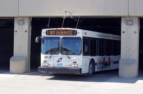 BORIS MINKEVICH / WINNIPEG FREE PRESS General Winnipeg Transit garage photos taken at 421 Osborne St. Photos taken from the sidewalk of the garages with open doors. July 21, 2016