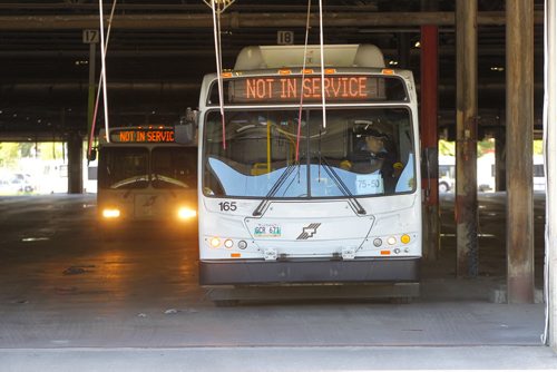 BORIS MINKEVICH / WINNIPEG FREE PRESS General Winnipeg Transit garage photos taken at 421 Osborne St. Photos taken from the sidewalk of the garages with open doors. July 21, 2016