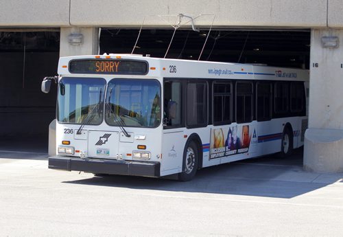 BORIS MINKEVICH / WINNIPEG FREE PRESS General Winnipeg Transit garage photos taken at 421 Osborne St. Photos taken from the sidewalk of the garages with open doors. July 21, 2016