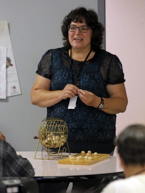 BORIS MINKEVICH / WINNIPEG FREE PRESS VOLUNTEER COLUMN- Shelley Malo volunteers every Thursday evening at Main Street Project. She leads Main Street Project clients in playing recreational bingo. July 21, 2016