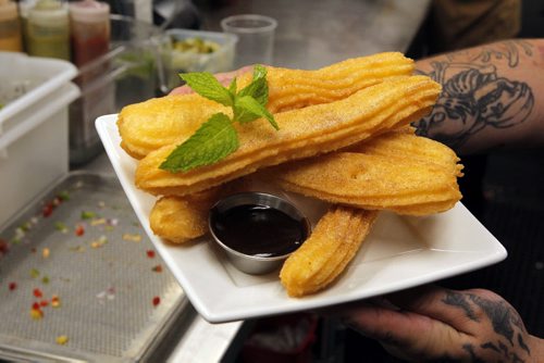 BORIS MINKEVICH / WINNIPEG FREE PRESS RESTAURANT REVIEW -  La Roca. 155 Smith Street. Mexican food.  Churros with carmel and chocolate. $7.  July 21, 2016