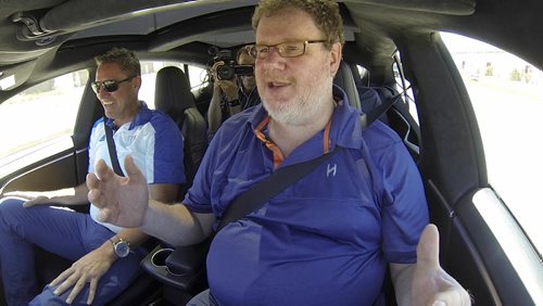 Tyler Walsh / Winnipeg Free Press  Free Press humour columnist Doug Speirs takes the 2015 Tesla Model S for a test drive with Nott Autocorp president Trevor Nott (front) and Free Press multimedia editor Tyler Walsh (back). Also in the car is Nott senior sales director Tom Nott. The fully electric vehicle features autopilot mode which allows drivers to hand over control to the vehicle.   July 22/16