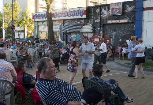 ZACHARY PRONG / WINNIPEG FREE PRESS  People dance to By Request, a polka band from Sarto, Manitoba, on Corydon Avenue during a weekly Dancing on the Avenue concert put on by Corydon Biz. The concerts take place every Friday and Saturday from 7-10 p.m. July 22, 2016.