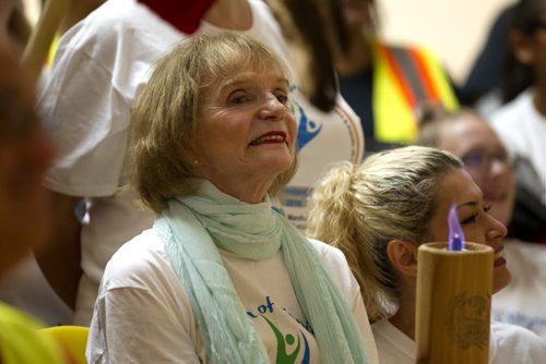 RUTH BONNEVILLE / WINNIPEG FREE PRESS  Elder Valerie Thompson, who organized the Torch of Dignity Relay for Manitobans, holds the torch at Thurnderbird House just prior the start of event Saturday.  Manitobans for Human Rights took part in the Torch of Dignity Relay along with cities around the world before the Summer Olympic games in Rio to spread the message of human rights and dignity.   Standup photo    July 23, 2016