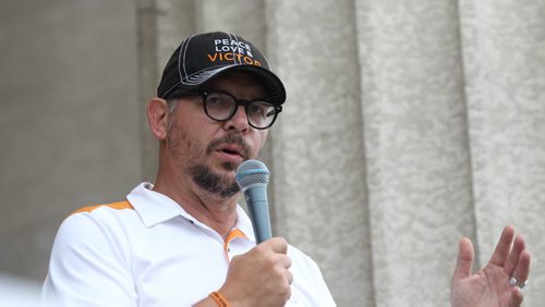 RUTH BONNEVILLE / WINNIPEG FREE PRESS   Former NHL star Theo Fleury talks about mental health and steps to recovery from childhood trauma on the steps of the  Legislative Building Saturday.  He and his team were on an across-Manitoba walk to give voices to those affected by trauma.  See story by Alex Paul.     July 23, 2016