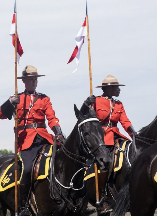 ZACHARY PRONG / WINNIPEG FREE PRESS  Const. Janis Kelly, right, performs with the RCMP Musical Ride at the Morris Stampede on July 23, 2016. Kelly, a Winnipeg native, is touring with the Musical Ride for the first time after a year of training.