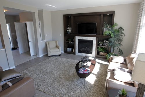 BORIS MINKEVICH / WINNIPEG FREE PRESS HOMES - 59 John Pelland Road in Sage Creek. Contact is Kensington Homes  salesman Rene Giroux. Living room.  July 25, 2016