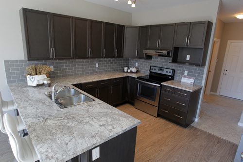 BORIS MINKEVICH / WINNIPEG FREE PRESS HOMES - 59 John Pelland Road in Sage Creek. Contact is Kensington Homes  salesman Rene Giroux.  Kitchen. July 25, 2016