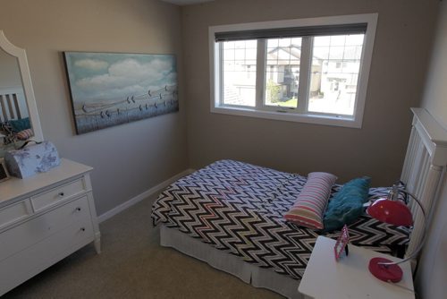 BORIS MINKEVICH / WINNIPEG FREE PRESS HOMES - 59 John Pelland Road in Sage Creek. Contact is Kensington Homes  salesman Rene Giroux.  Bedroom. July 25, 2016