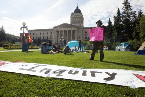 RUTH BONNEVILLE / WINNIPEG FREE PRESS   The Urban Warrior Alliance camp outside the legislature in protest to the delays in the MMIW, Murdered and Missing Indigenous Women, inquiry Tuesday.       July 26, 2016