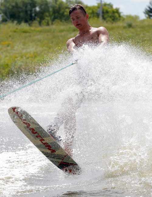 BORIS MINKEVICH / WINNIPEG FREE PRESS STANDUP - 16 year old Lukas Neustaedter practices some trick skiing at Lake Shirley Water Ski Park (A man-made lake built for the 1999 Pan American Games used for water ski events as well as dragon boat races, 365 Murdock Road in South Transcona.) He has been a competition water skier for 5 years and started skiing at the young age of 2. He is part of Team Manitoba with 6 other members. The team is training for the Western Canadian Water Ski Championships in Saskatoon, Saskatchewan that happens this weekend. Last year he places second overall at the Western Canadian Water Ski Championships. This year Manitoba is host to the 2016 Canadian National Water Ski Championships next month. July 27, 2016