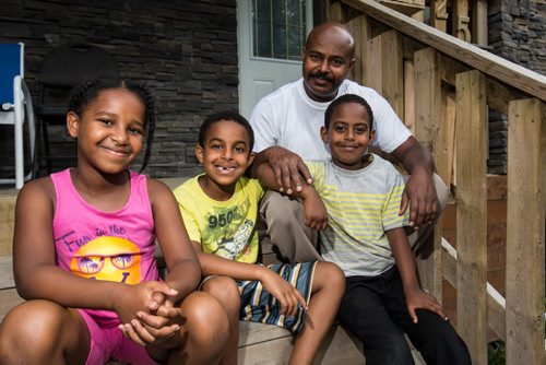 MIKE DEAL / WINNIPEG FREE PRESS Michael Hagos is looking forward to sending the kids off to camp this summer, (from left) Christina, 9, Simeon, 7, and Mousse, 6. 160727 - Wednesday, July 27, 2016
