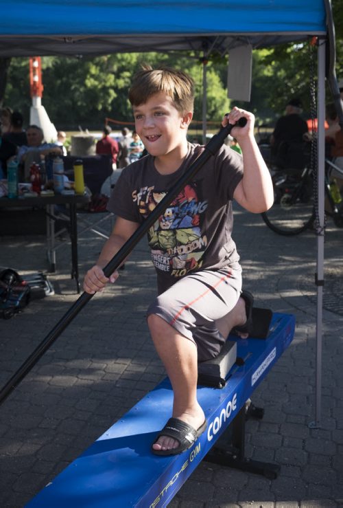 ZACHARY PRONG / WINNIPEG FREE PRESS  Tanner Melnyk of Winnipeg, 10, tries out a rowing machine at the Canada Games One Year Countdown celebration at the Forks. Athletes ran interactive kiosks demonstrating some of the sports that be presented at the Canada Summer Games. July 28, 2016.