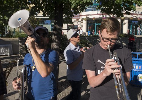 ZACHARY PRONG / WINNIPEG FREE PRESS  Members of the Dirty Catfish Brass Band perform at the Canada Games One Year Countdown at The Forks on July 28, 2016.