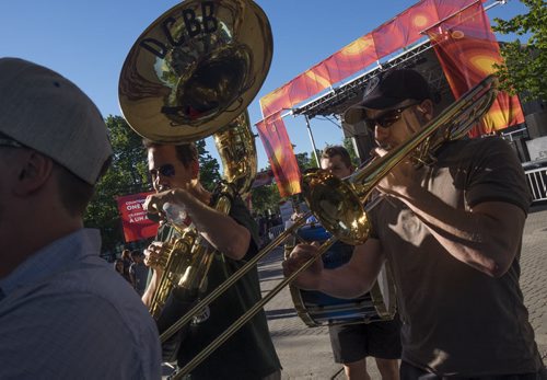 ZACHARY PRONG / WINNIPEG FREE PRESS  Members of the Dirty Catfish Brass Band perform at the Canada Games One Year Countdown at The Forks on July 28, 2016.
