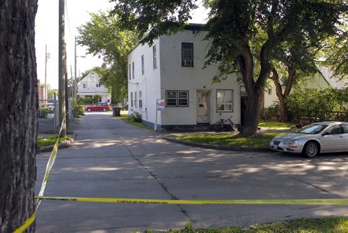 BORIS MINKEVICH / WINNIPEG FREE PRESS NEWS - Crime scene in the 100 block of Bannerman Ave. - Front of multi unit building facing Bannerman. Side lane on west side of building.    (from press release) Homicide Investigation  C16-156802 On July 28, 2016, at approximately 11:30 p.m., Winnipeg Police general patrol and Tactical Support Team units attended to the 100 block of Bannerman Avenue for a report of gun shots heard in the area.  It was determined that an incident had occurred in a multi-family residence on this block which has now resulted in an ongoing investigation by the Winnipeg Police Service Homicide Unit.  July 29, 2016
