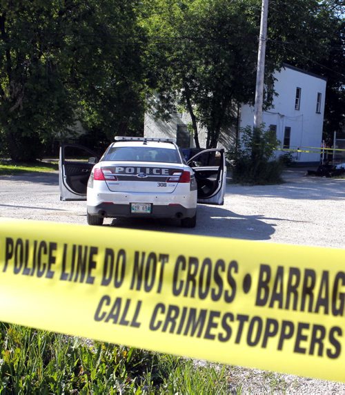 BORIS MINKEVICH / WINNIPEG FREE PRESS NEWS - Crime scene in the 100 block of Bannerman Ave. - View facing the back of the address looking from the north/west.  (from press release) Homicide Investigation  C16-156802 On July 28, 2016, at approximately 11:30 p.m., Winnipeg Police general patrol and Tactical Support Team units attended to the 100 block of Bannerman Avenue for a report of gun shots heard in the area.  It was determined that an incident had occurred in a multi-family residence on this block which has now resulted in an ongoing investigation by the Winnipeg Police Service Homicide Unit.  July 29, 2016
