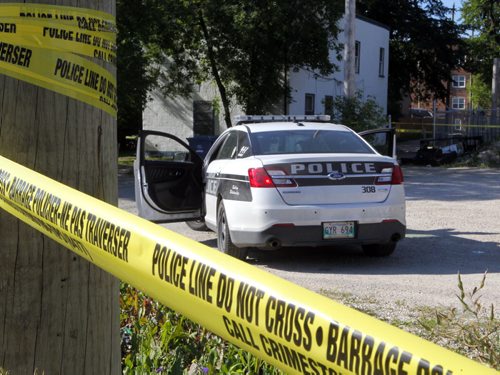 BORIS MINKEVICH / WINNIPEG FREE PRESS NEWS - Crime scene in the 100 block of Bannerman Ave. - View facing the back of the address. Looking from the north/west.  (from press release) Homicide Investigation  C16-156802 On July 28, 2016, at approximately 11:30 p.m., Winnipeg Police general patrol and Tactical Support Team units attended to the 100 block of Bannerman Avenue for a report of gun shots heard in the area.  It was determined that an incident had occurred in a multi-family residence on this block which has now resulted in an ongoing investigation by the Winnipeg Police Service Homicide Unit.  July 29, 2016