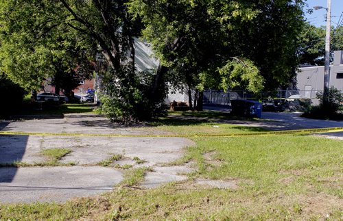 BORIS MINKEVICH / WINNIPEG FREE PRESS NEWS - Crime scene in the 100 block of Bannerman Ave. - View facing the back of the address.  (from press release) Homicide Investigation  C16-156802 On July 28, 2016, at approximately 11:30 p.m., Winnipeg Police general patrol and Tactical Support Team units attended to the 100 block of Bannerman Avenue for a report of gun shots heard in the area.  It was determined that an incident had occurred in a multi-family residence on this block which has now resulted in an ongoing investigation by the Winnipeg Police Service Homicide Unit.  July 29, 2016
