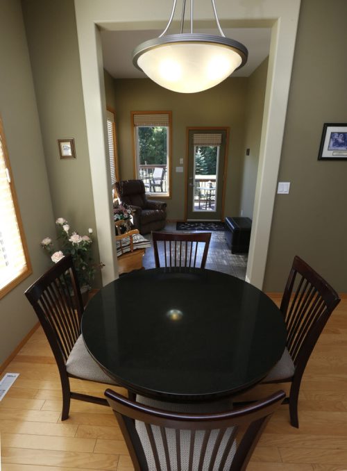 WAYNE GLOWACKI / WINNIPEG FREE PRESS    Homes.  The eating area off of the kitchen at 108 Oak Way in Grand Pointe.  The realtor is Charlene Urbanski. Todd Lewys story  August 02 2016