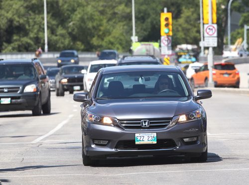 JOE BRYKSA / WINNIPEG FREE PRESSTraffic in Osborne Village area- Aug 02, 2016 -(See Kelly Taylor 49.8 driving feature)