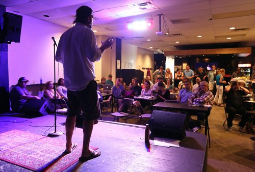 JASON HALSTEAD / WINNIPEG FREE PRESS  Presenter Christopher Beauvilain of the Frosty Mug Photo Project makes his pitch at the first-ever Winnipeg SOUP crowdfunding event at the Handsome Daughter bar on July 19, 2016. (See Social Page)