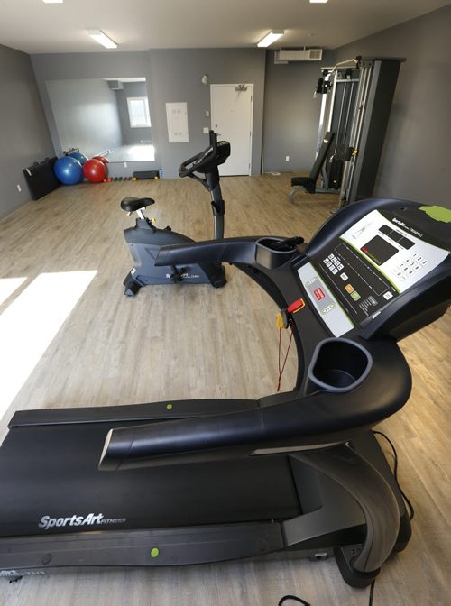 WAYNE GLOWACKI / WINNIPEG FREE PRESS    Homes. For a story on the second phase of The Woods condominiums at 89 Creek Bend Road. This is the fitness room in The Woods phase one, phase 2 has not been built yet. The sales rep. is  David Powell.   Todd Lewys story  August 03 2016