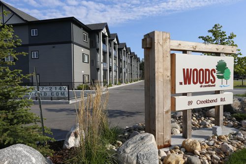 WAYNE GLOWACKI / WINNIPEG FREE PRESS    Homes. For a story on the second phase of The Woods condominiums at 89 Creek Bend Road. This is a exterior of phase one, phase 2 has not been built. The sales rep. is  David Powell.   Todd Lewys story  August 03 2016