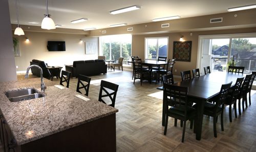 WAYNE GLOWACKI / WINNIPEG FREE PRESS    Homes. For a story on the second phase of The Woods condominiums at 89 Creek Bend Road. This is the owner's lounge on the third floor in The Woods phase one, phase 2 has not been built yet. The sales rep. is  David Powell.   Todd Lewys story  August 03 2016