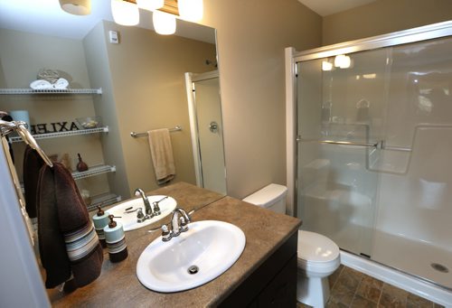 WAYNE GLOWACKI / WINNIPEG FREE PRESS    Homes. For a story on the second phase of The Woods condominiums at 89 Creek Bend Road. The bath room off of the master bedroom in the display suite in The Woods phase one, phase 2 has not been built yet . The sales rep. is  David Powell.   Todd Lewys story  August 03 2016