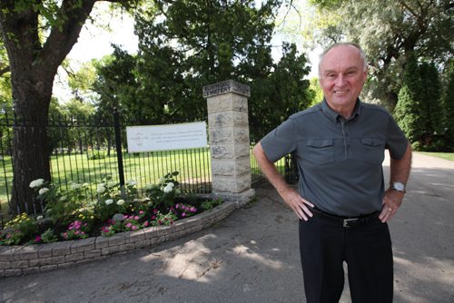 RUTH BONNEVILLE / WINNIPEG FREE PRESS  Series on cemeteries.  Elmwood Cemetery, off Hespeler Avenue with Executive Director Jim Baker at entrance.    See Bill Redekop story.   Aug 03, 2016