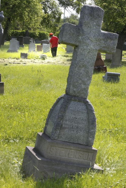 WAYNE GLOWACKI / WINNIPEG FREE PRESS       Lawn cutting in the  St. James Anglican Church cemetery. Kevin Rollason  story  August 03 2016