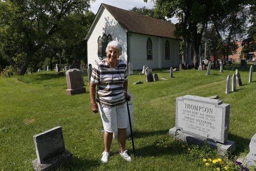 WAYNE GLOWACKI / WINNIPEG FREE PRESS  Margaret Steele gave the tour of the St. James Anglican Church cemetery across from Polo Park on Portage Avenue. She is by her family's grave where she also wants be buried. Kevin Rollason  story  August 03 2016